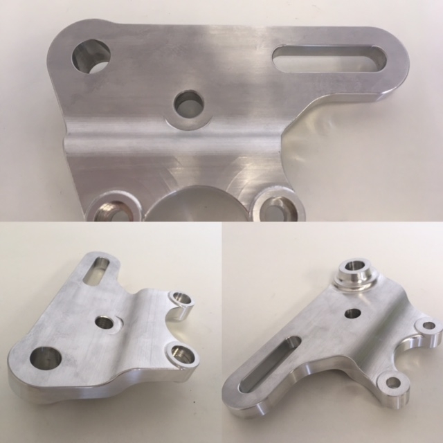 Custom fabricated rear brake caliper bracket, CNC porn!